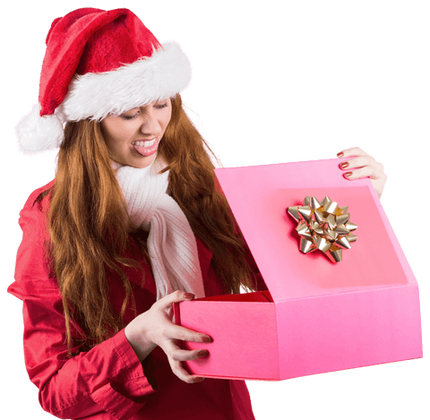 Joyful Redhead Opening Gift with Santa Hat and Pink Box