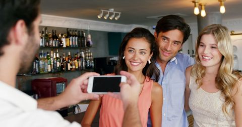 Young Friends Enjoying Time Together in Bar - Download Free Stock Images Pikwizard.com