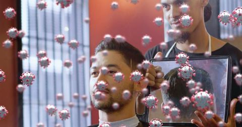 Digital composite of hair salon during pandemic with virus particles