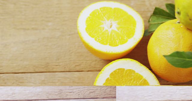 Fresh Lemons with Leaves on Wooden Surface - Download Free Stock Images Pikwizard.com