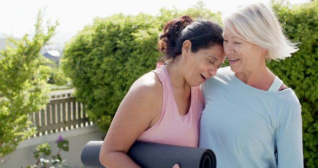 Two Women Smiling and Hugging After Outdoor Exercise - Download Free Stock Images Pikwizard.com