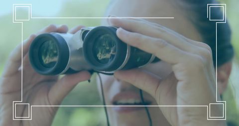Woman Observing with Binoculars in Outdoor Setting - Download Free Stock Images Pikwizard.com