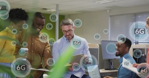 Diverse professionals innovating with 6g technology in corporate office