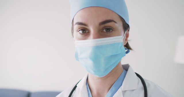 Close-Up Surgeon Wearing Surgical Mask in Medical Uniform - Download Free Stock Images Pikwizard.com