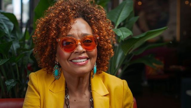 Fashionable Senior Woman on Relaxing Day Out at Cafe