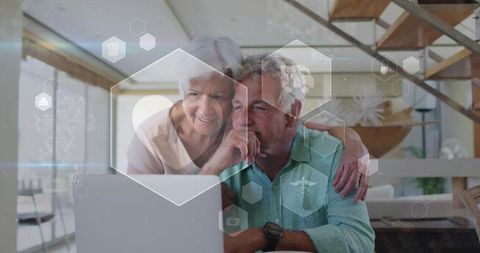 Senior Couple Engaging with Technology in Modern Smart Home
