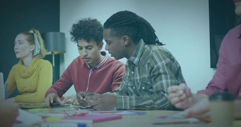 Young Diverse Team Collaborating in Creative Office Meeting