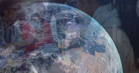 Globe overlay with diverse business team in office setting
