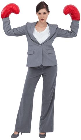 Confident Businesswoman Wearing Boxing Gloves on Transparent Background