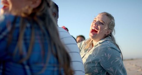 Joyful Gathering Beach Party with Friends Outdoors