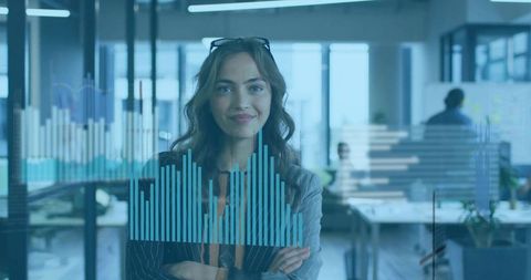 Businesswoman Analyzing Data on Digital Display in Modern Workspace