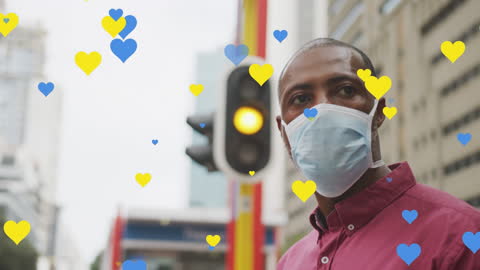 Man Wearing Face Mask with Heart Icons Spreading Pandemic Awareness