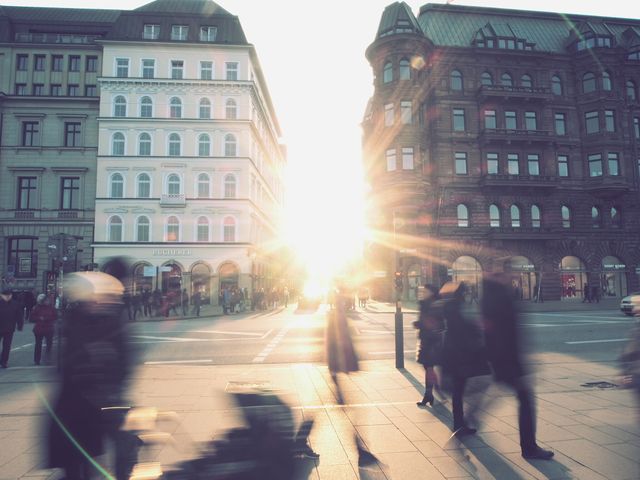 Sunset in Urban Street with Blurred Pedestrians - Download Free Stock Images Pikwizard.com