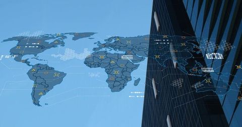 Projecting digital world map overlay over glass skyscraper showing global data network