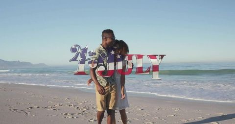 Romantic Beach Walk Couple Celebrating Fourth of July