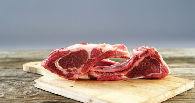 Fresh Raw Lamb Chops on Wooden Cutting Board - Download Free Stock Images Pikwizard.com