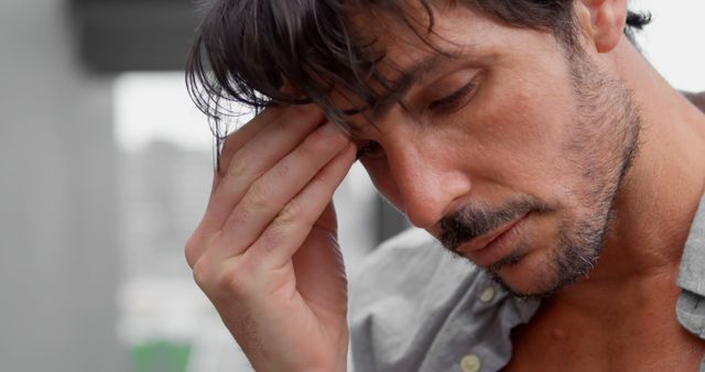 Stressed Man Touching Forehead Deep in Thought - Download Free Stock Images Pikwizard.com