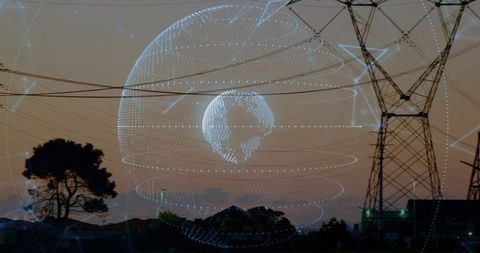 Holographic globe over power lines symbolizing connectivity and innovation