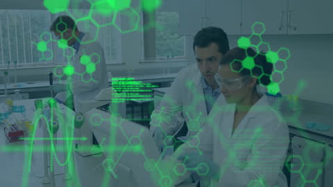 Scientists Analyzing Data in High-Tech Laboratory