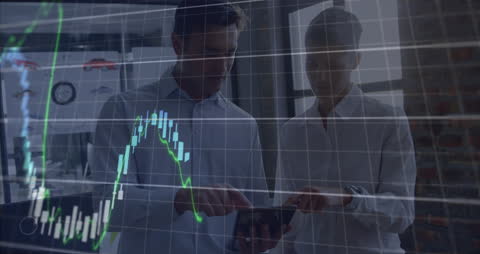 Business Professionals Analyzing Financial Data with Digital Visualization