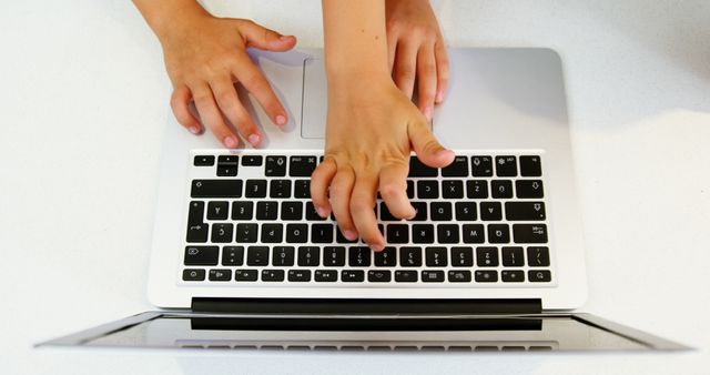 Child Typing on Laptop Keyboard - Download Free Stock Images Pikwizard.com