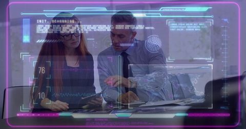 Business Professionals Collaborating on Technology with Data Interphases