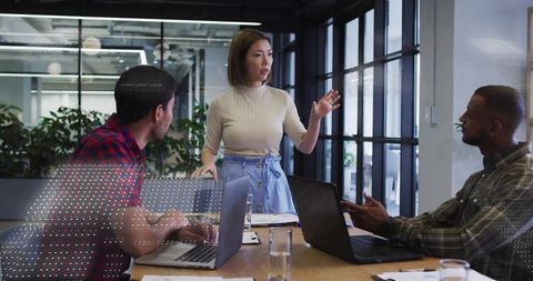 Diverse Team Engaged in Corporate Meeting