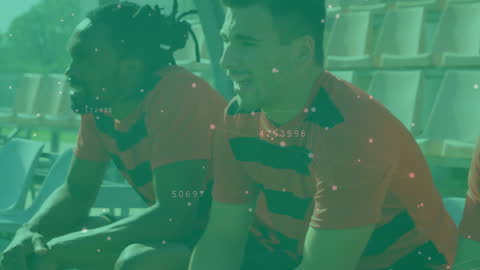 Rugby Players Engaging in Digital Data Animation at Stadium