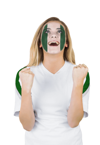 cheerful nigerian sports fan with painted face and raised fists - Download Free Stock Videos Pikwizard.com