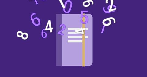 Celebratory notebook with dangling numbers on purple