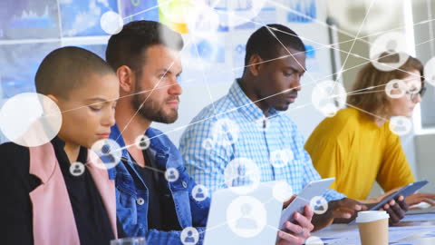 Diverse Team Collaborating on Digital Network Visualization