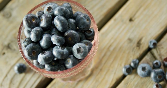 Fresh Blueberries in Glass Bowl on Wooden Table - Download Free Stock Images Pikwizard.com