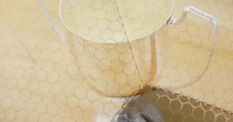 Optical Illusion of Soccer Ball on Silver Mug