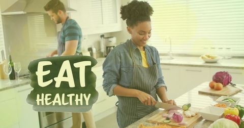 Diverse Couple Preparing Healthy Meal in Modern Kitchen