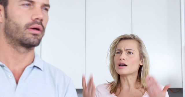 Couple Having Argument in Modern Kitchen - Download Free Stock Images Pikwizard.com