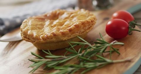 Freshly Baked Pie with Rosemary and Cherry Tomatoes