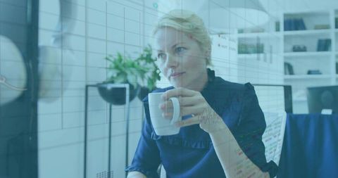 Business executive reviewing metrics in modern office