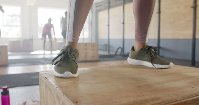 Close-Up of Woman's Legs Doing Box Jumps at Gym - Download Free Stock Images Pikwizard.com