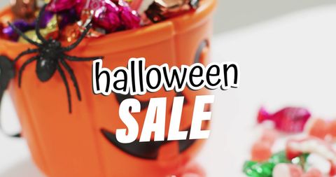 Halloween Sale Promotion with Candy Bucket and Spider Decoration