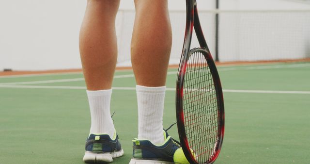 Close-Up of Tennis Player's Legs and Racket on Court - Download Free Stock Images Pikwizard.com