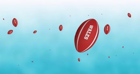 Multiple Rugby Balls in Motion Against Blue Sky