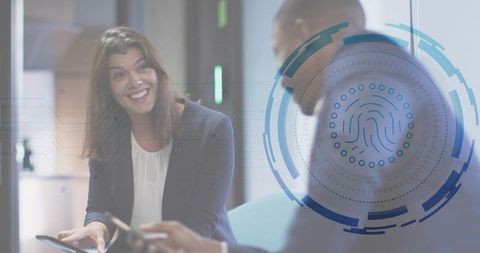 Colleagues Discussing Biometric Security While Using Tablet and Phone in Modern Office