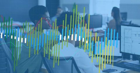 Women collaborating in modern open office with digital data overlay, charts and monitors