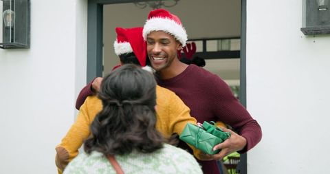Festive Family Reunion at Christmas with Embracing and Gifts