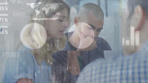 Team Collaboration Amidst Digital Data Visualizations at Office