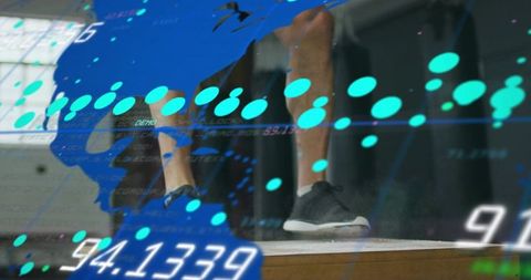 Man standing on stage wearing sneakers with cyan augmented reality data overlay for presentation