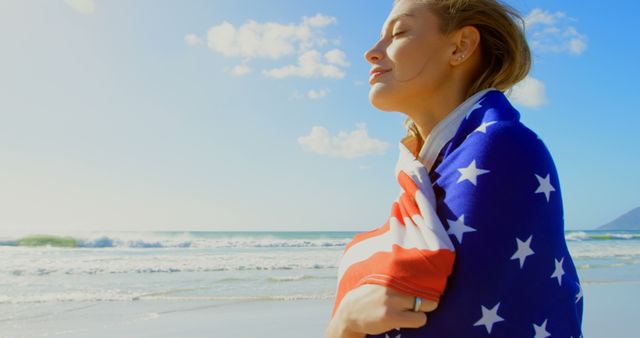 Young American Woman Embracing Flag on Beach on Sunny Day - Download Free Stock Images Pikwizard.com