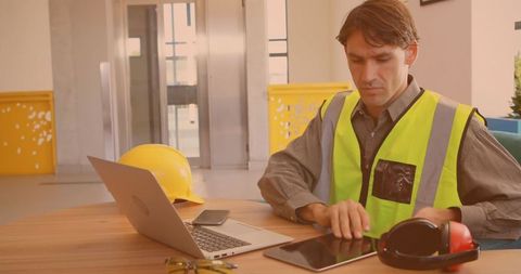 Male engineer using digital technology at workplace