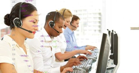 Call center agents typing at keyboards wearing headsets with html overlay for tech support