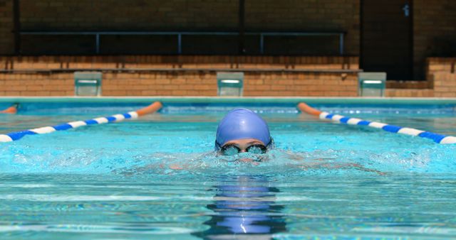 Lap swimmer practicing in outdoor pool - Download Free Stock Images Pikwizard.com